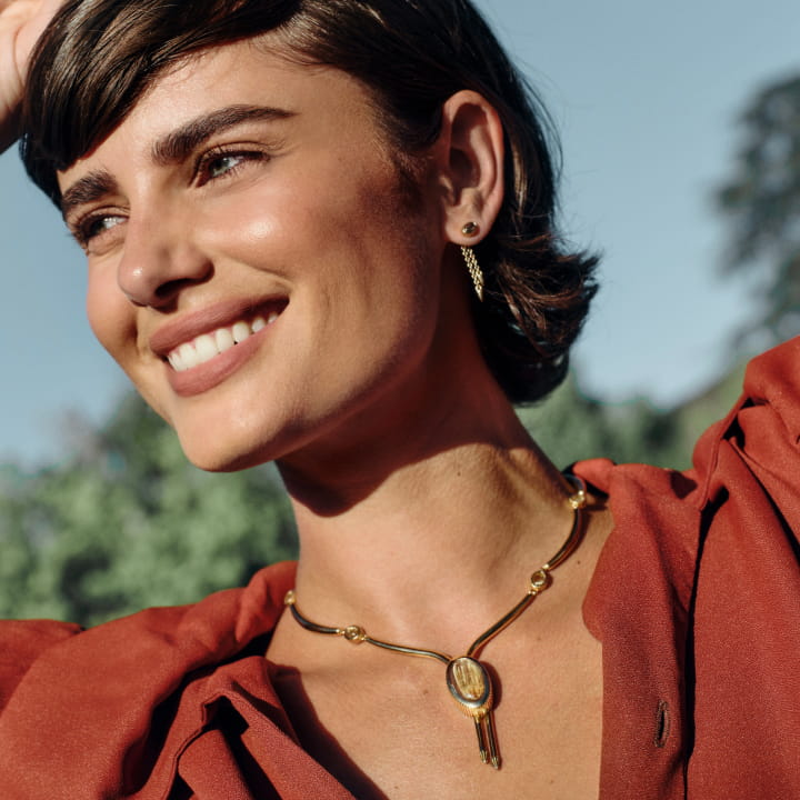 Image of Taylor Hill wearing the Big Bolo Necklace.