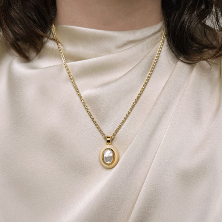 Image of the Core Pendant in cream resin.